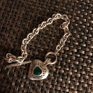 Silver bracelet with emerald green charm